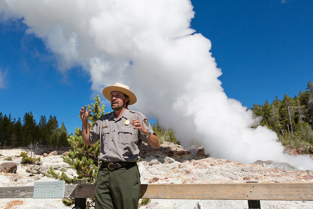 Park_Ranger_and_Steamboat_Geyser_in_steam_phase_Sept_4_2014